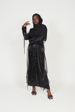 'Six figures' open abaya