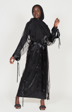 'Six figures' open abaya