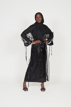 'Six figures' open abaya